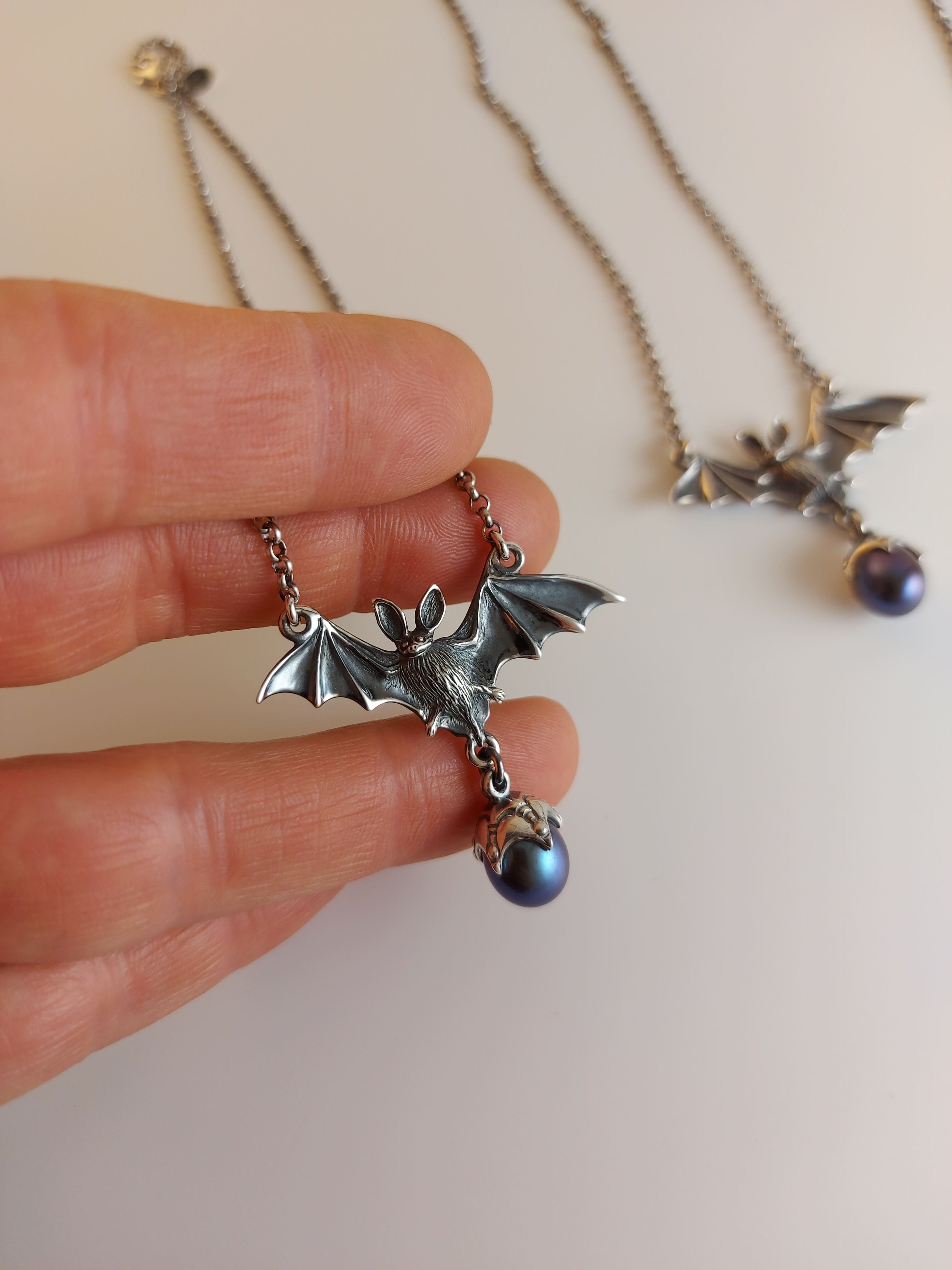 Bat with Pearl Necklace