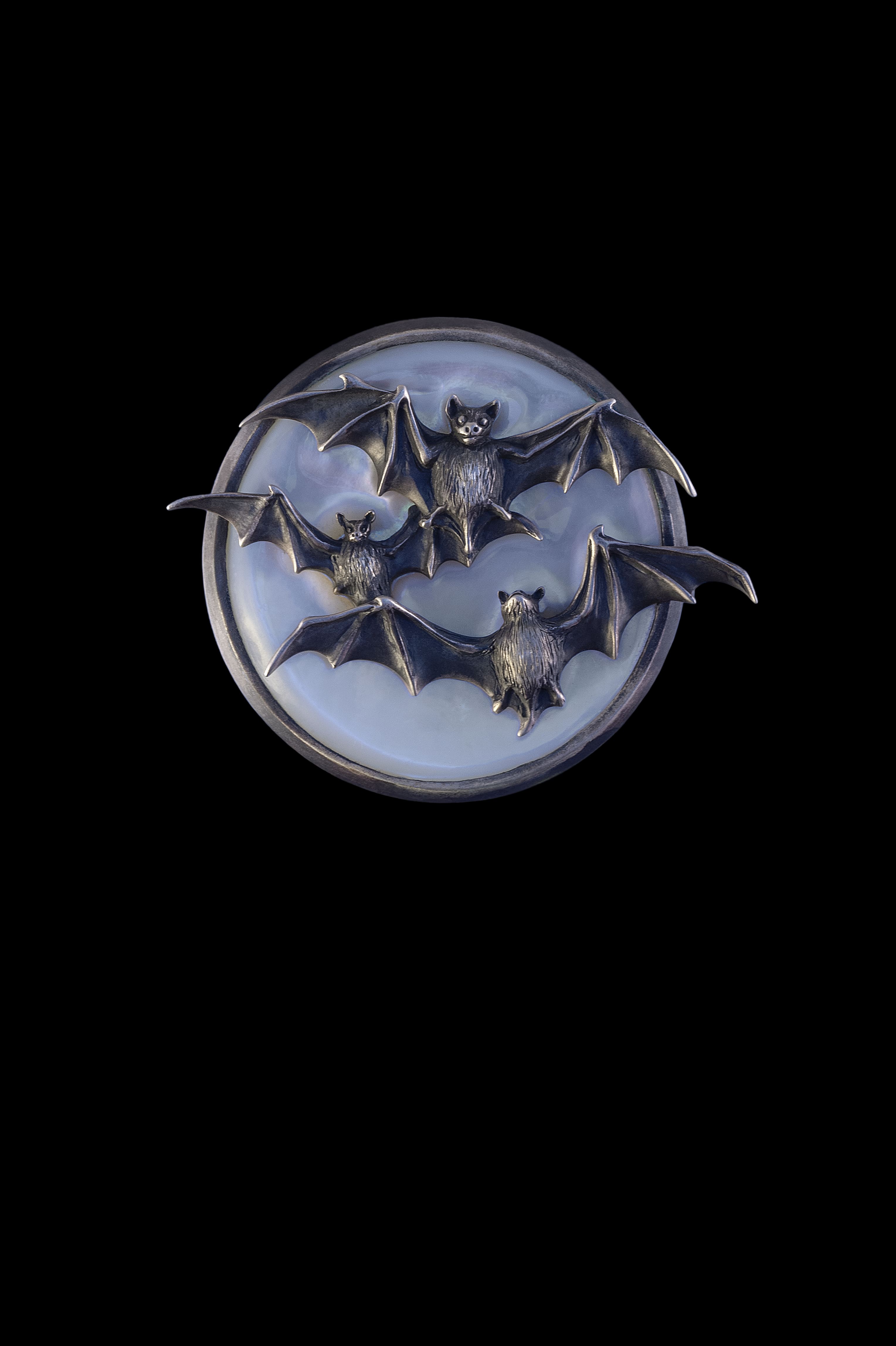 Bats over a Pearl Moon