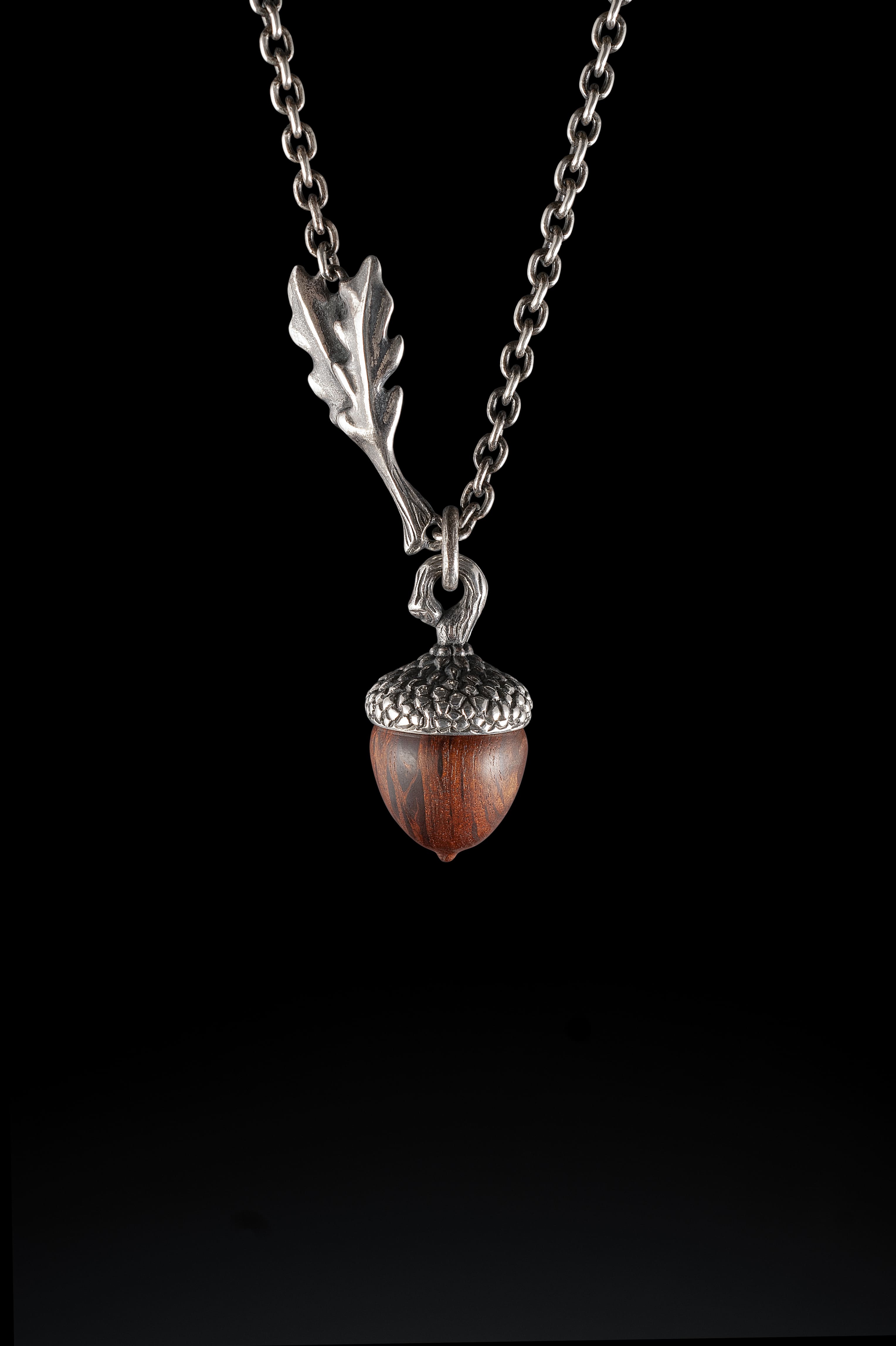 Acorn Necklace with Oak Leaves on a Sterling Silver chain. The Acorn itself is hand carved in timber.
